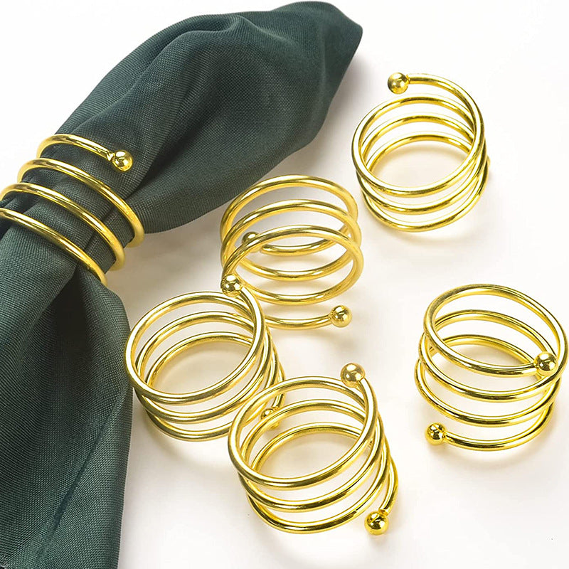4 Pc Plated Spiral Aluminum Napkin Rings Gold