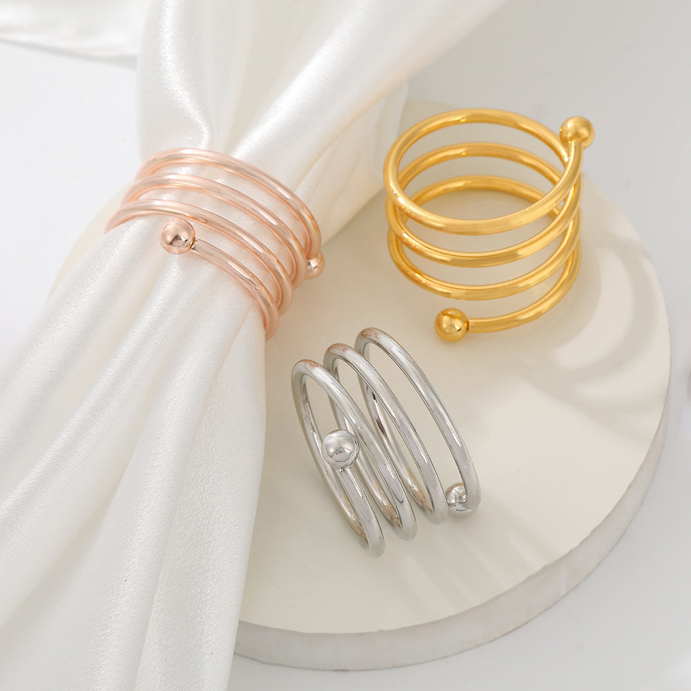 4 Pc Plated Spiral Aluminum Napkin Rings Gold