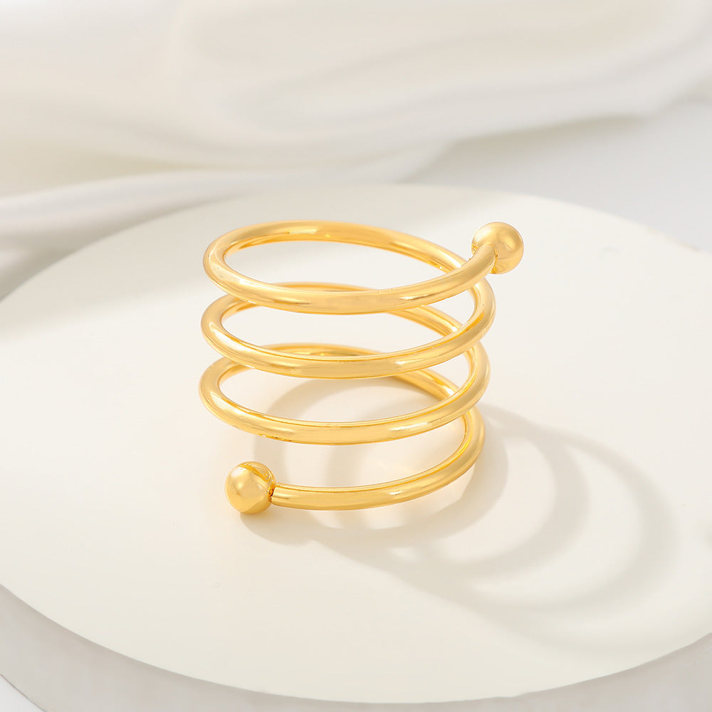 4 Pc Plated Spiral Aluminum Napkin Rings Gold