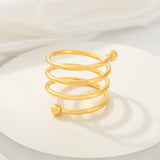 4 Pc Plated Spiral Aluminum Napkin Rings Gold