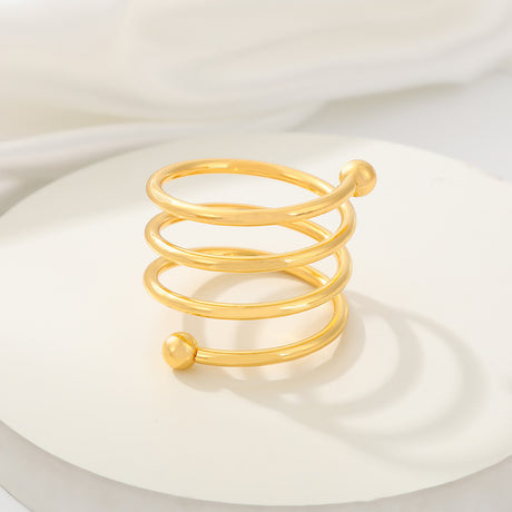 4 Pc Plated Spiral Aluminum Napkin Rings Gold