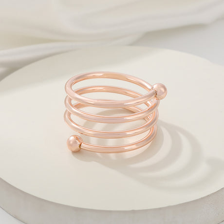 4 Pc Plated Spiral Aluminum Napkin Rings Rose Gold
